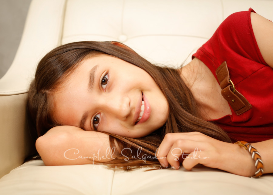  Portrait of girl on modern grey background by family photographers at Campbell Salgado Studio in Portland, Oregon. 