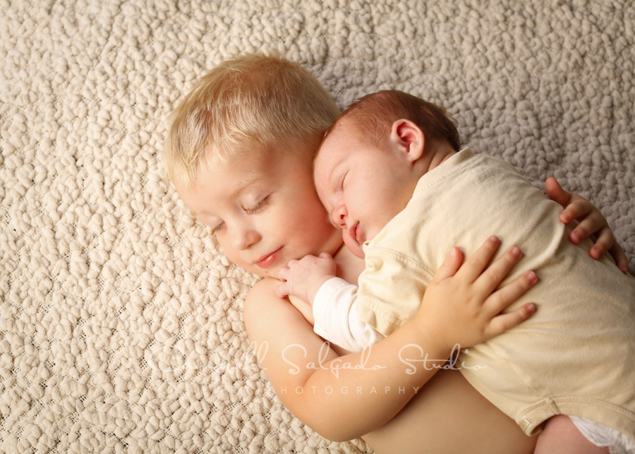  Portrait of brothers on blankies background by chjild photographers at Campbell Salgado Studio in Portland, Oregon. 