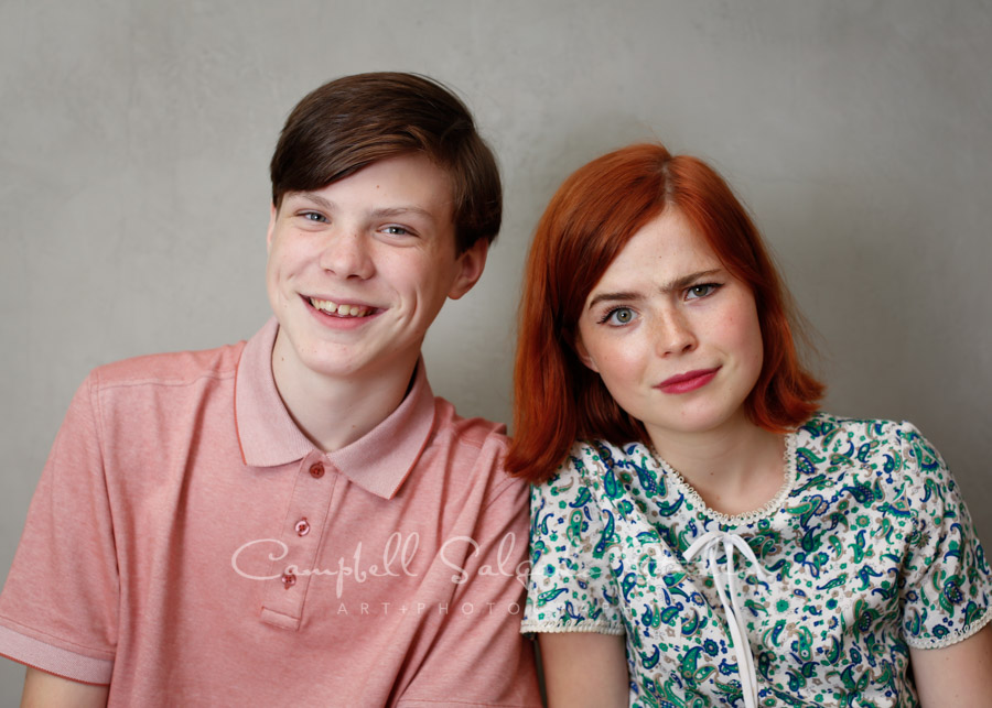  Portrait of family on modern gray background by family photographers at Campbell Salgado Studio in Portland, Oregon. 