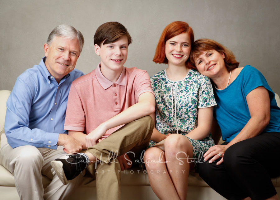  Portrait of family on modern gray background by family photographers at Campbell Salgado Studio in Portland, Oregon. 