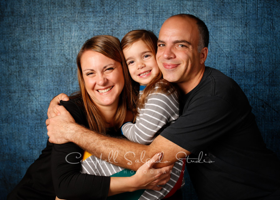  Portrait of family on denim background by family photographers at Campbell Salgado Studio in Portland, Oregon. 