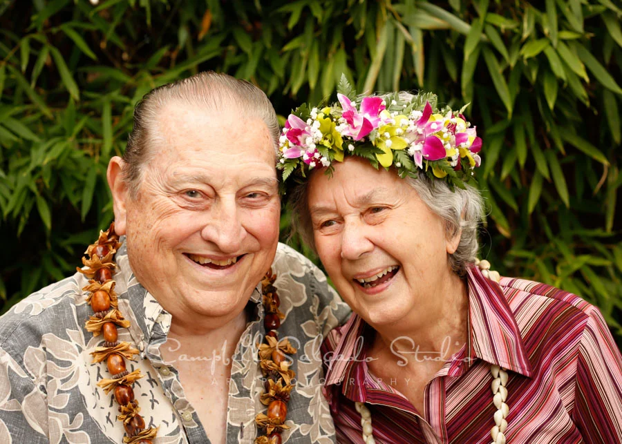 Portrait of couple on bamboo background by family photographers at Campbell Salgado Studio in Portland, Oregon.