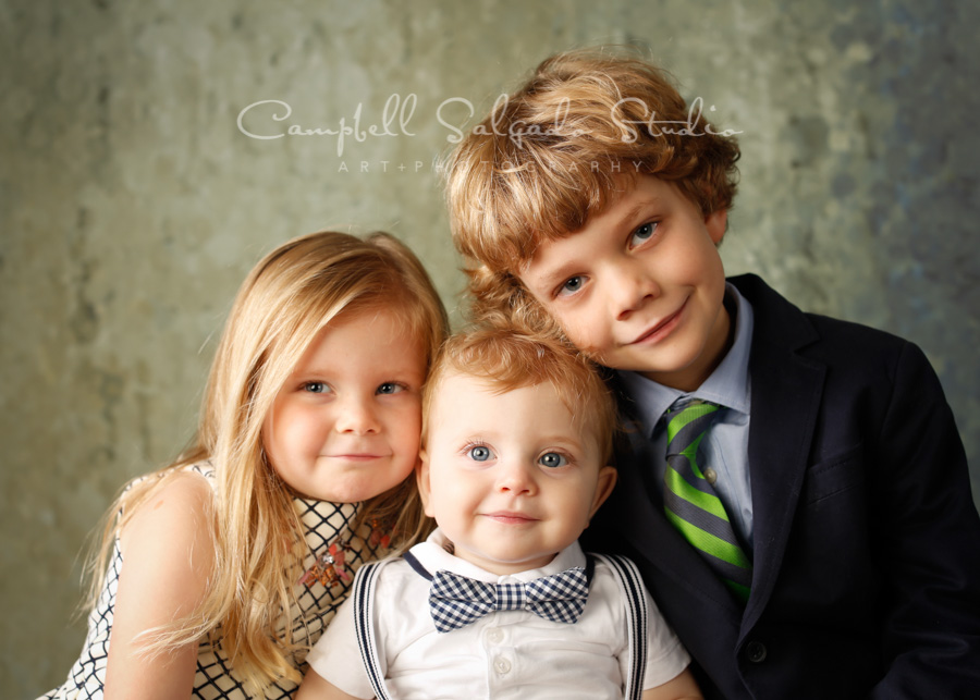  Portrait of children on rain dance background by child's photographers at Campbell Salgado Studio in Portland, Oregon. 