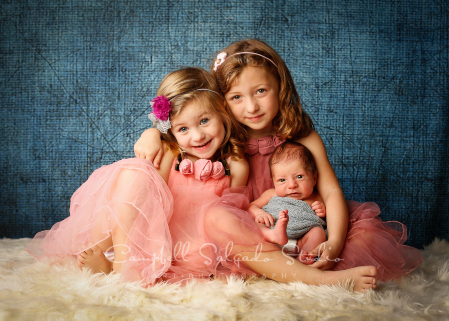  Portrait of children on denim background by family photographers at Campbell Salgado Studio in Portland, Oregon. 