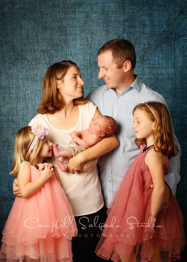 Portrait of family on denim background by family photographers at Campbell Salgado Studio in Portland, Oregon.