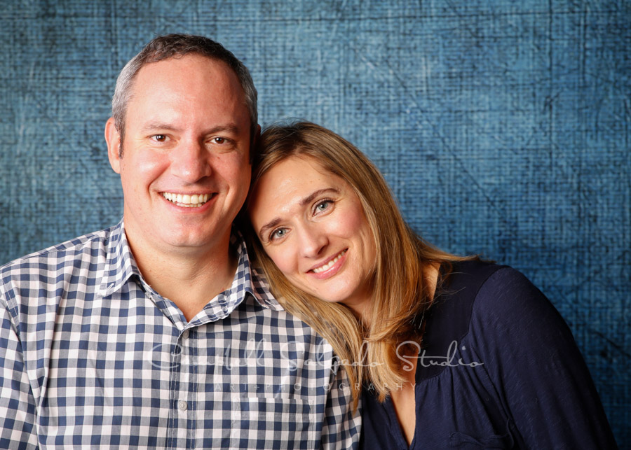  Portrait of couple on denim background by family photographers at Campbell Salgado Studio in Portland, Oregon. 