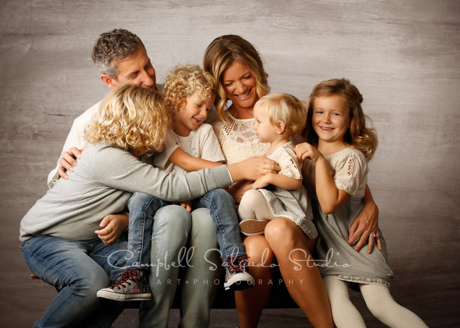  Portrait of family on graphite background by family photographers at Campbell Salgado Studio in Portland, Oregon. 