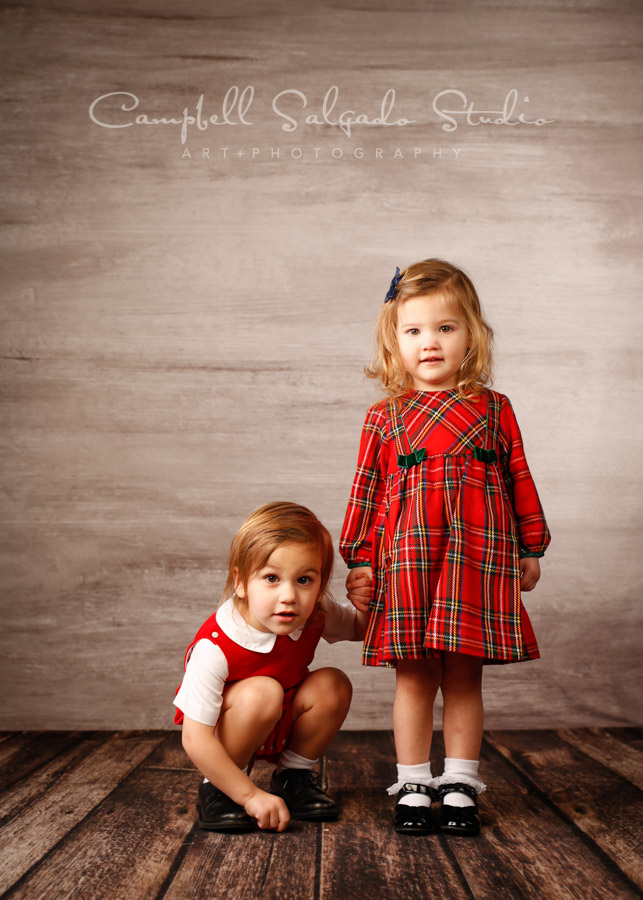  Portrait of twins on graphite background by child photographers at Campbell Salgado Studio in Portland, Oregon. 