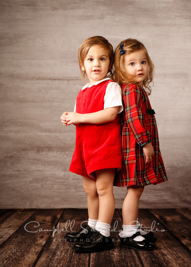  Portrait of twins on graphite background by child photographers at Campbell Salgado Studio in Portland, Oregon. 