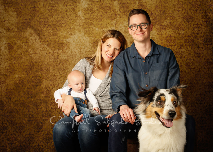  Portrait of family on amber light background by family photographers at Campbell Salgado Studio in Portland, Oregon. 