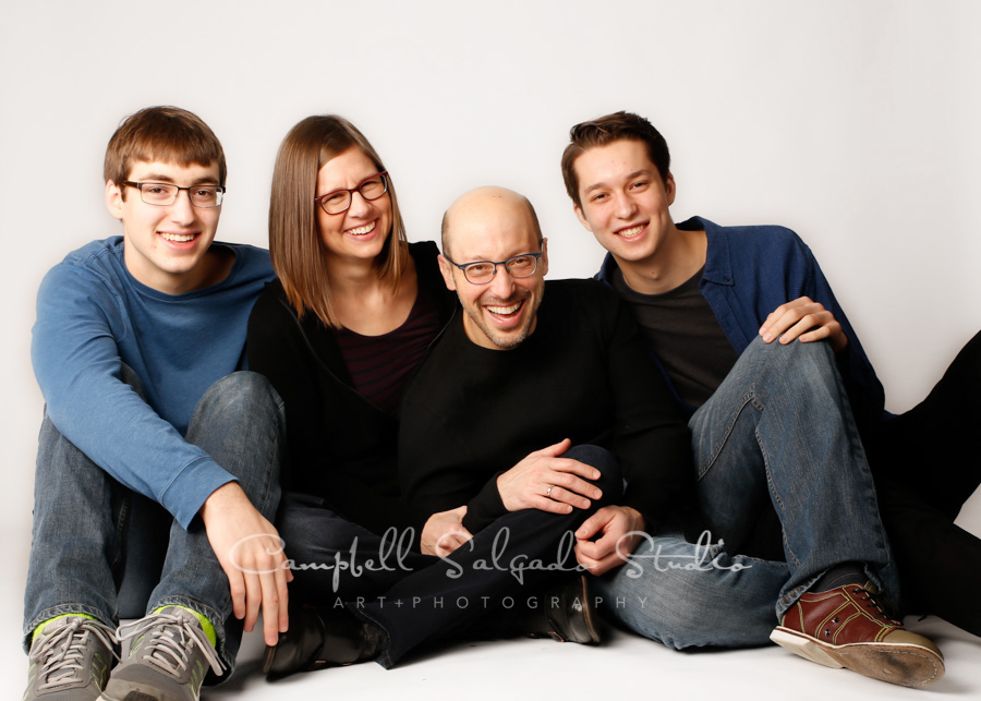  Portrait of family on white background by family photographers at Campbell Salgado Studio in Portland, Oregon. 