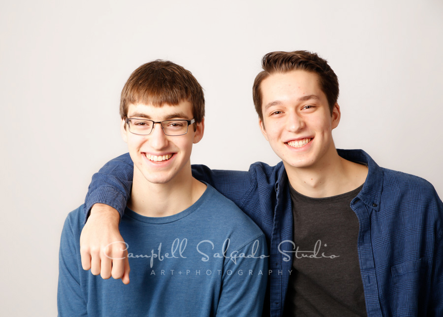  Portrait of boys on white background by family photographers at Campbell Salgado Studio in Portland, Oregon. 