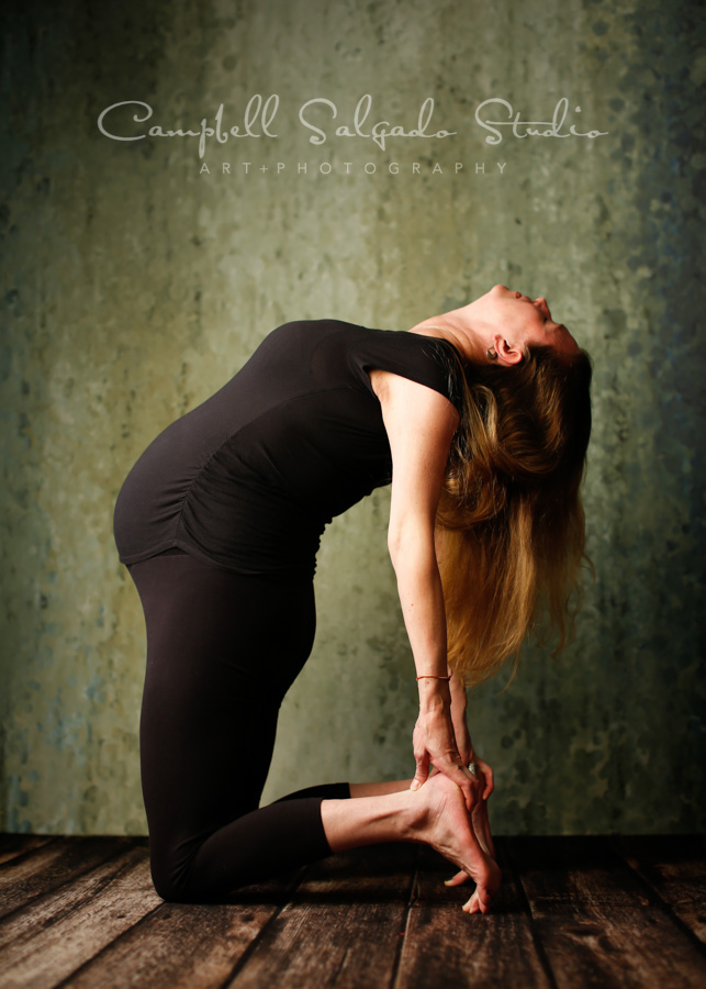  Portrait of woman on rain dance background by maternity photographers at Campbell Salgado Studio in Portland, Oregon. 