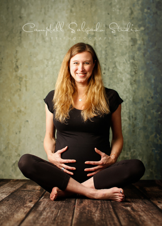  Portrait of woman on rain dance background by maternity photographers at Campbell Salgado Studio in Portland, Oregon. 