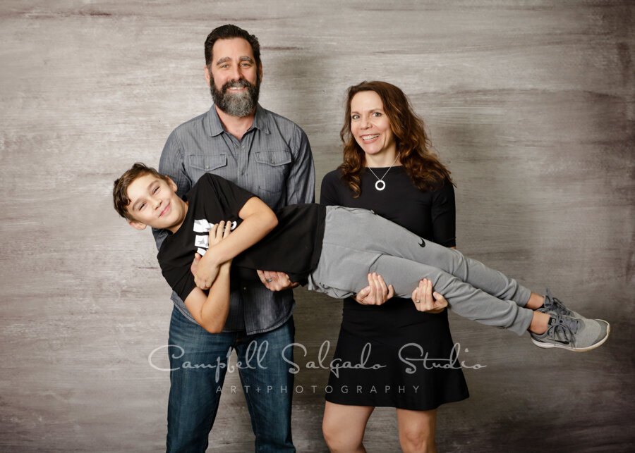  Portrait of family on graphite background by family photographers at Campbell Salgado Studio in Portland, Oregon. 