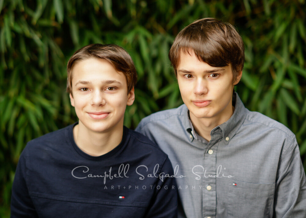  Portrait of brothers on bamboo background by teen photographers at Campbell Salgado Studio in Portland, Oregon. 