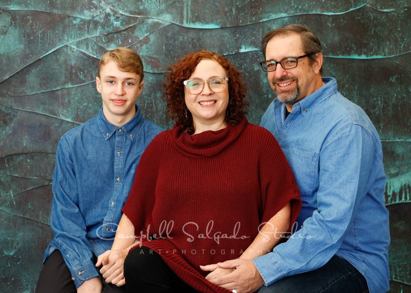  Portrait of family on ocean weave background by family photographers at Campbell Salgado Studio in Portland, Oregon. 
