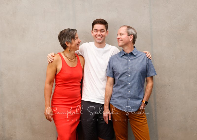  Portrait of family on modern grey background by family photographers at Campbell Salgado Studio in Portland, Oregon. 
