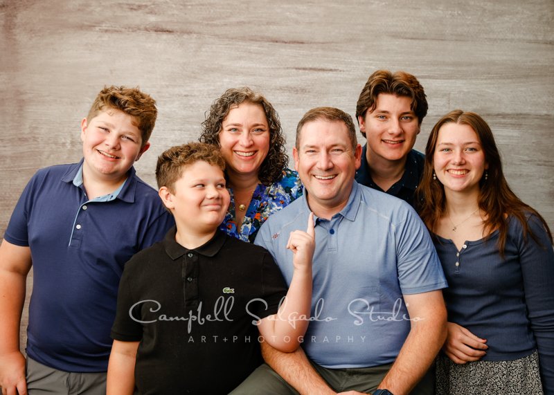  Portrait of family on graphite background by family photographers at Campbell Salgado Studio in Portland, Oregon. 