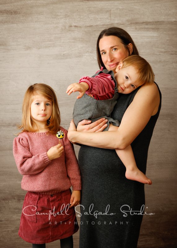  Portrait of mother and children on graphite background by family photographers at Campbell Salgado Studio in Portland, Oregon. 