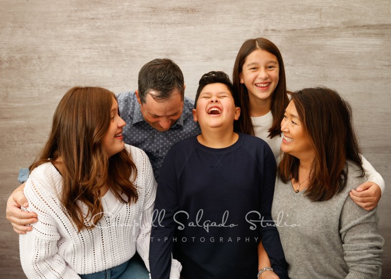  Portrait of family on graphite background by family photographers at Campbell Salgado Studio in Portland, Oregon. 