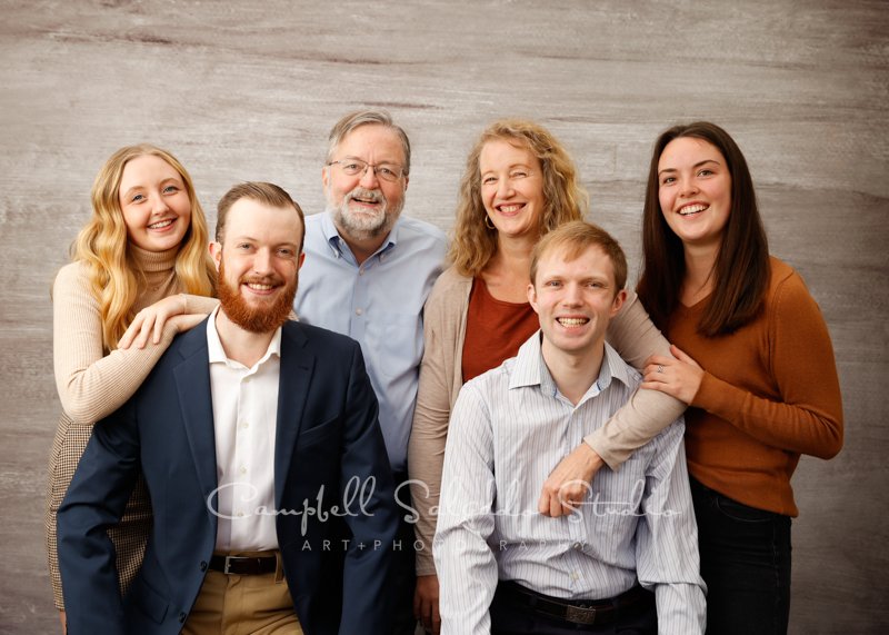  Portrait of family on graphite background by family photographers at Campbell Salgado Studio in Portland, Oregon. 