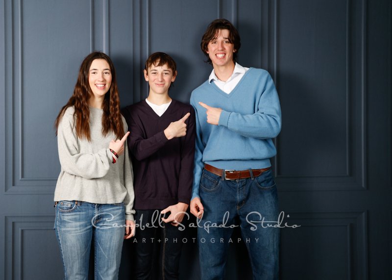  Portrait of teens on Portland Parlour background by teen photographers at Campbell Salgado Studio in Portland, Oregon.  