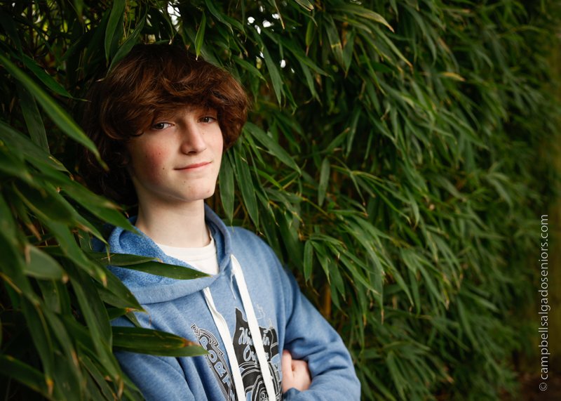  Portrait of teen on bamboo background by teen photographers at Campbell Salgado Studio in Portland, Oregon. 