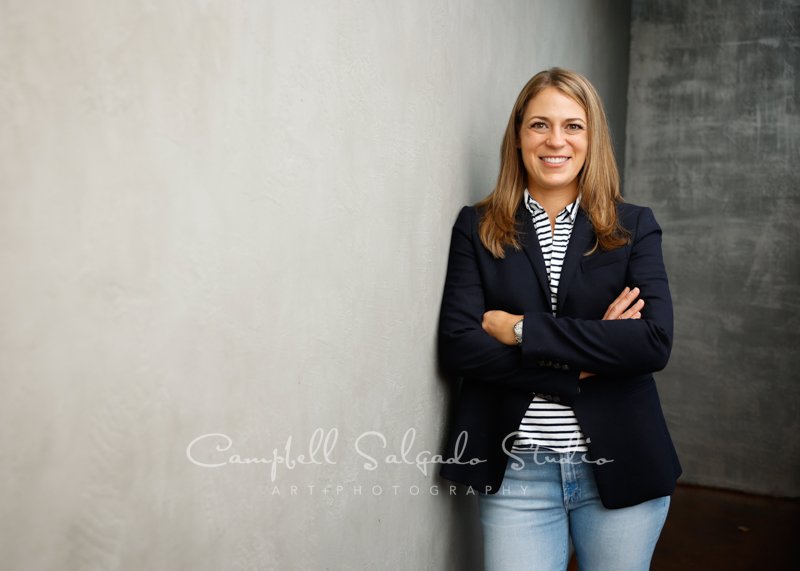  Commercial portrait of individual on modern grey background by commercial photographers at Campbell Salgado Studio. 