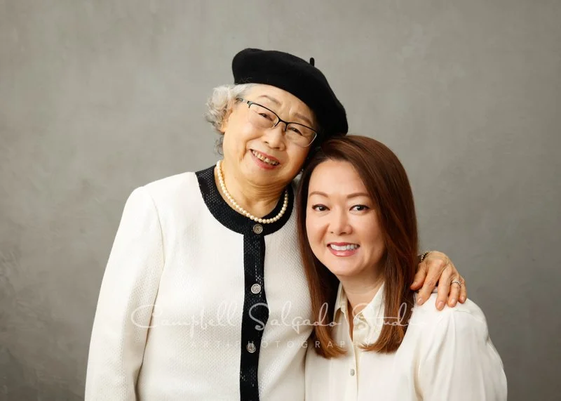  Portrait of multi-generational family on modern grey background by family photographers at Campbell Salgado Studio in Portland, Oregon. 