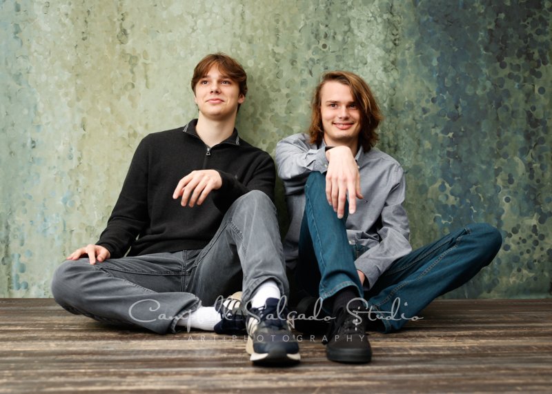  Portrait of brothers on rain dance background by family photographers at Campbell Salgado Studio in Portland, Oregon. 