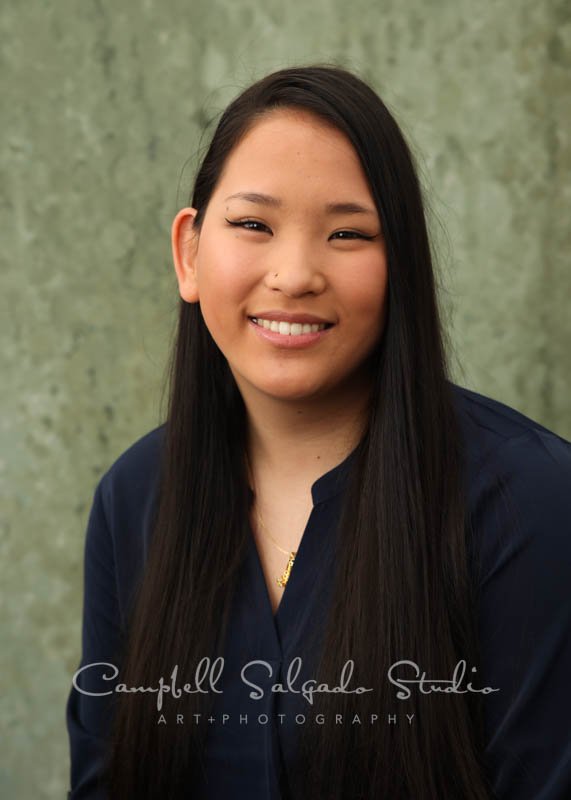  Portrait of young woman on rain dance background by individual photographers at Campbell Salgado Studio in Portland, Oregon. 