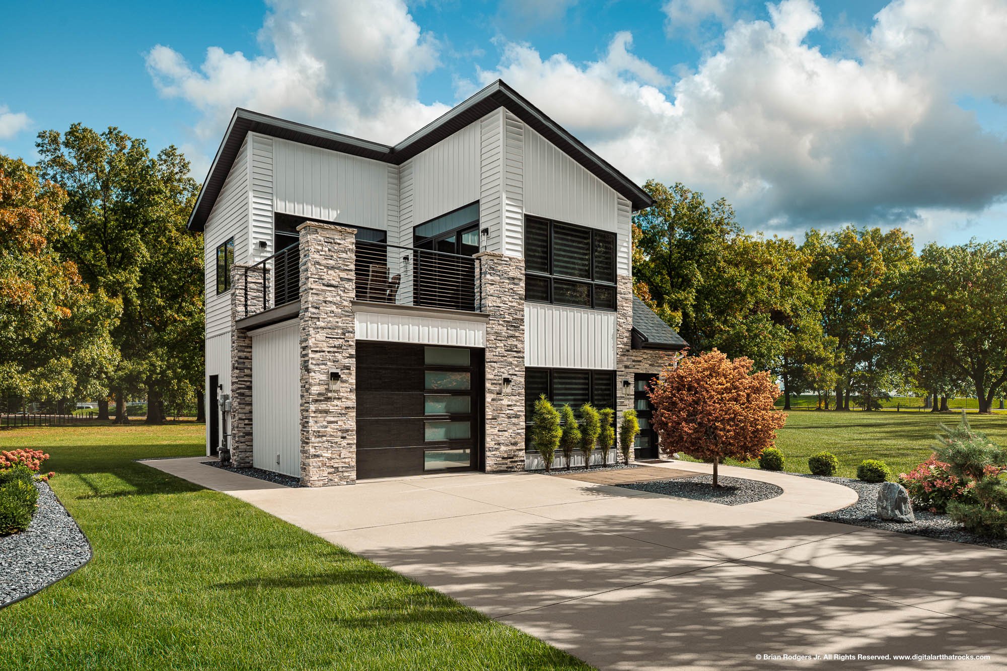 Exterior architectural photography of a modern two-story custom home featuring stone veneer and vertical siding in Indianapolis, Indiana, captured for luxury custom home builders and residential architects.