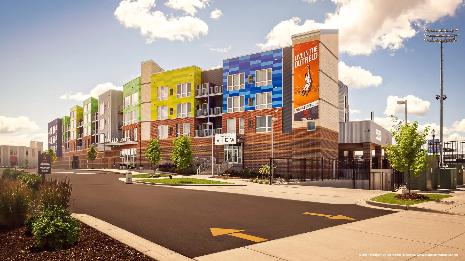 Commercial architectural photography of the colorful, modern Outfield Lofts apartments in Lansing, Michigan. Photographer for architects, construction companies & branded urban enviornments.