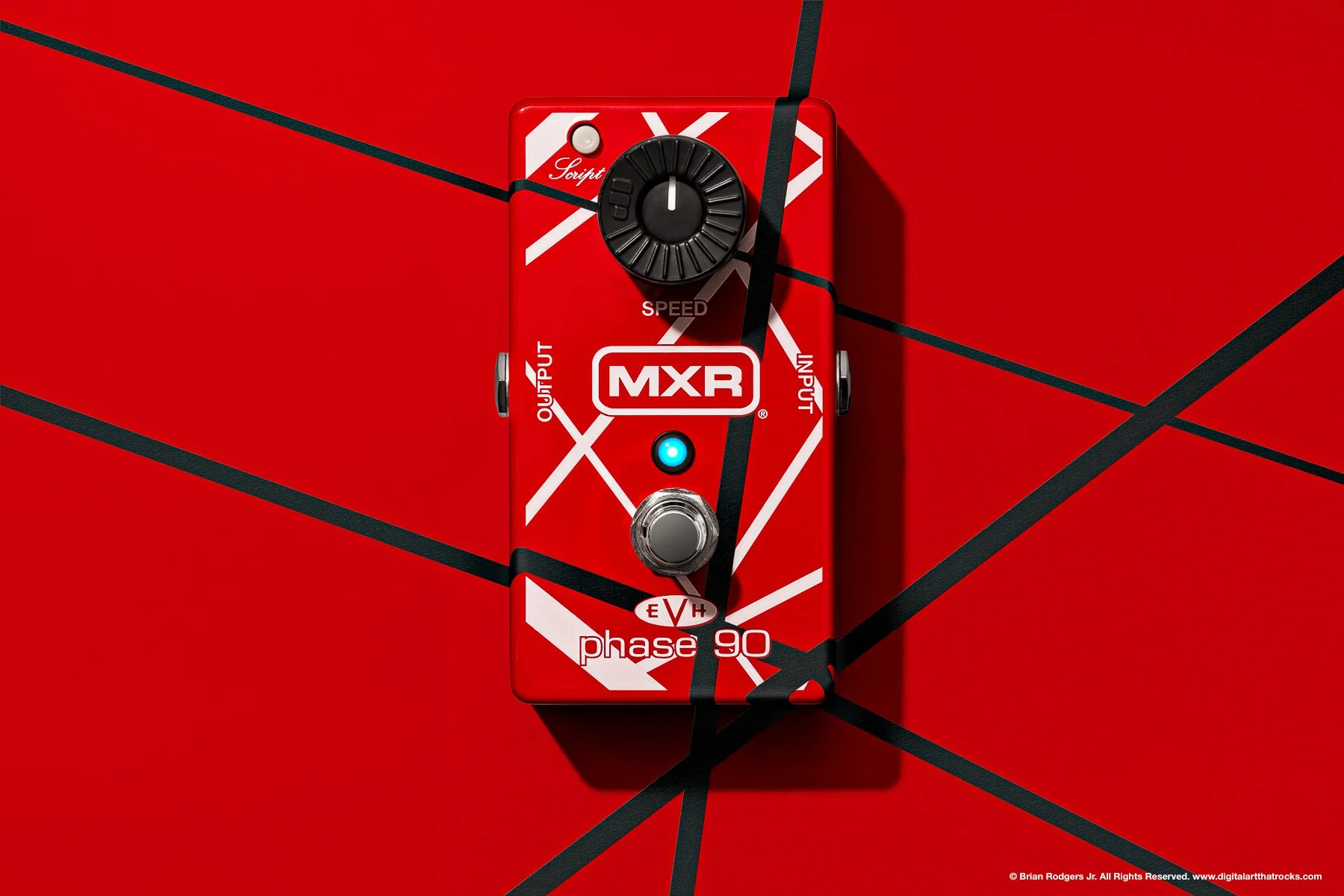 Hero shot product photo of an red, white and black striped boutique guitar pedal, photographed overhead with hard shadows and a deep red background. The black stripes wrap around the pedal and onto the background for a unique creative effect.