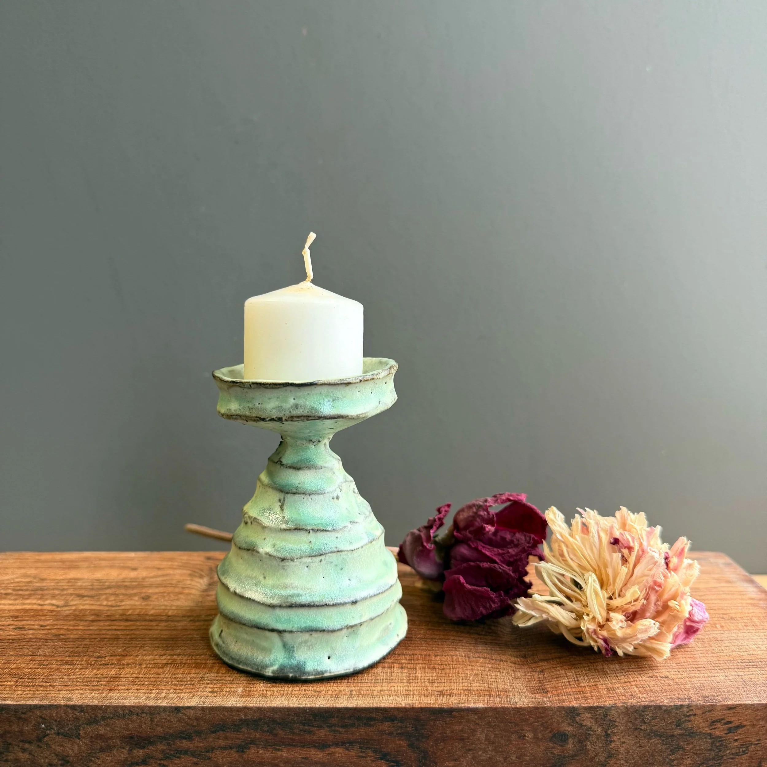 Votive- 3.5” round carved