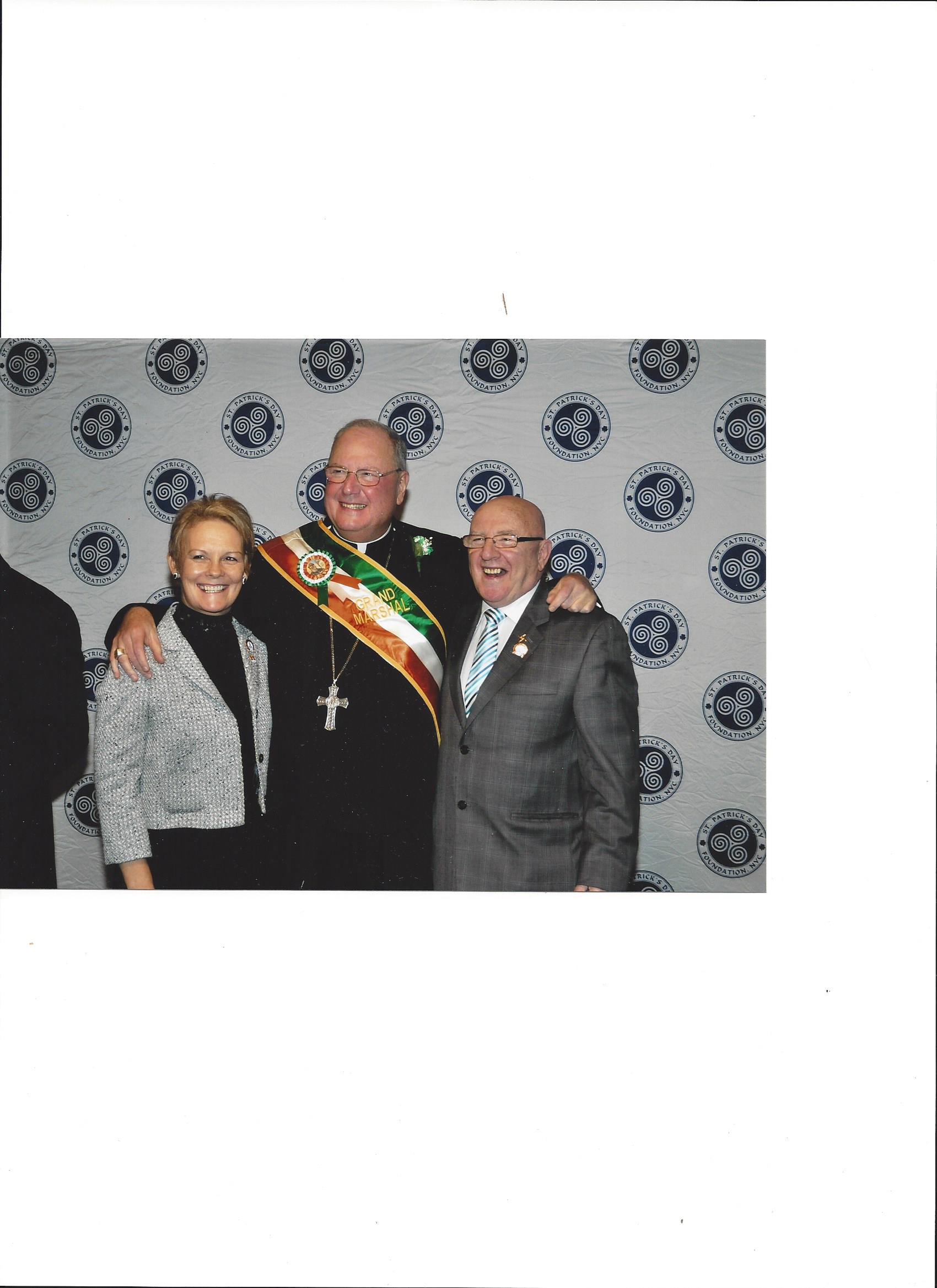 Treasa and Tommy with Grand Marshal.jpg