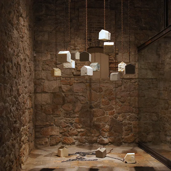 towns, 2013 - cement, polyurethane foam, chains, 18x18x22cm each