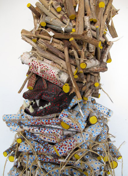 Hesssapheia doce crown open air dream a long leaf plaza, from another land. (detail) 2010 Acrylic, white birch wood, various found wood, twine, bicycle inner tubes, fake teeth, aluminum foil, chicken wire, and duck tape 53 x 20 x 20 inches