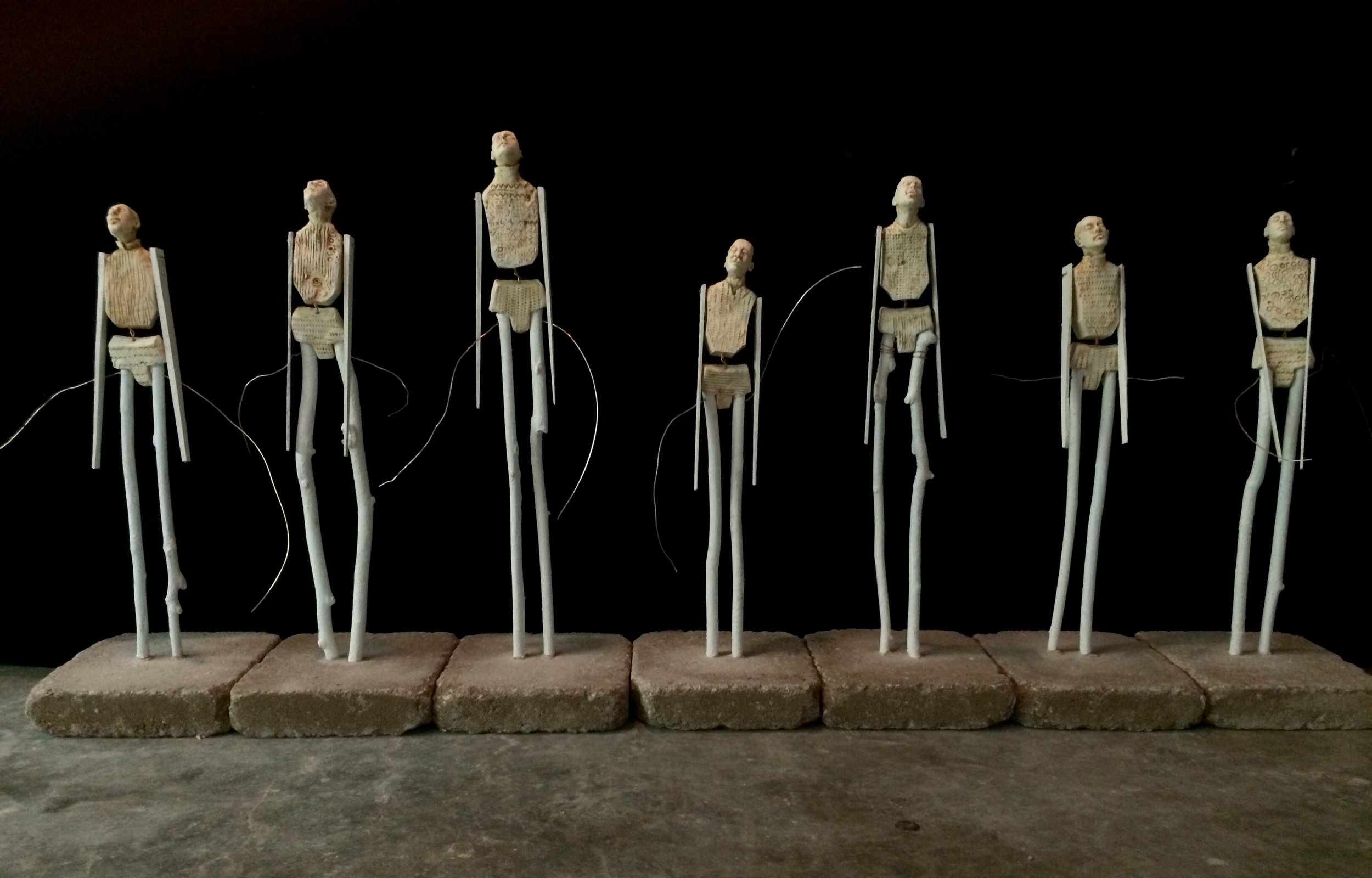 The Stickleys, 16"-22"tall, fired clay and painted sticks