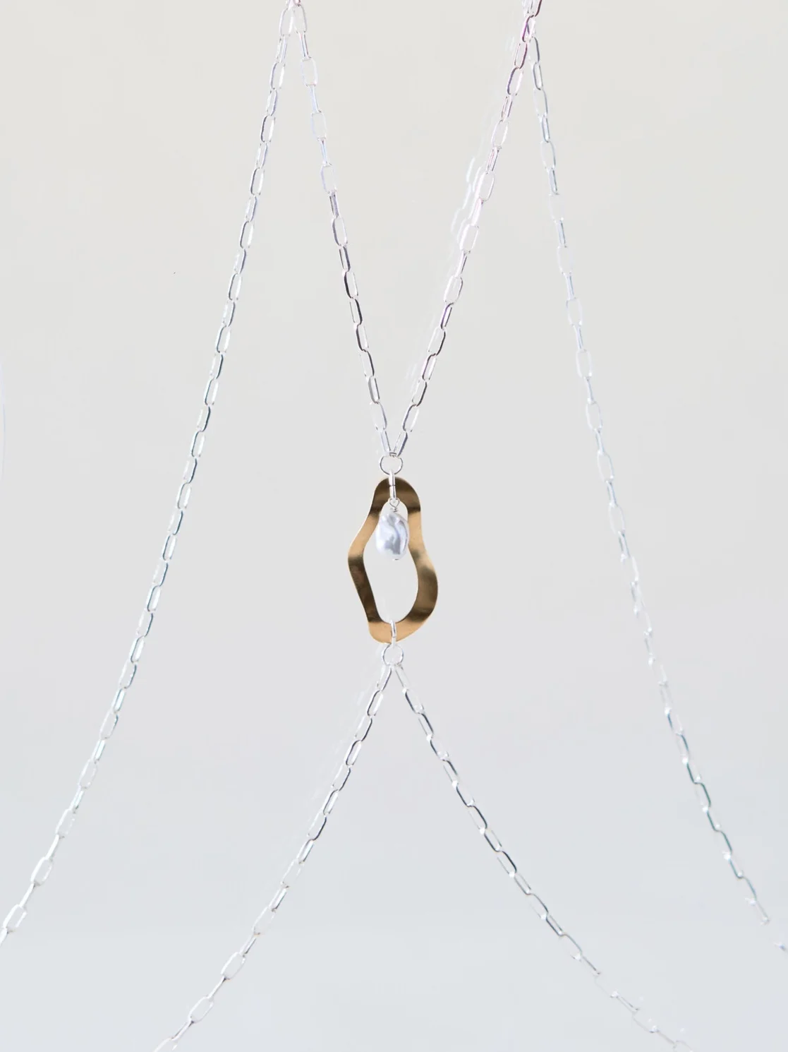 Dolorous+Jewelry+SS19+Silver+and+Pearl+Bodychain+Harness.jpg