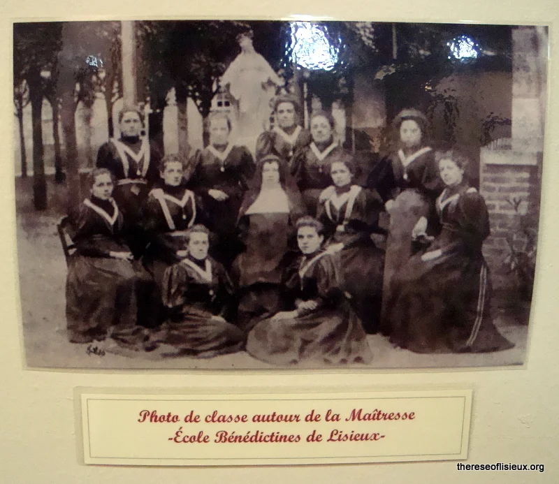 A class at the Benedictine Abbey gathered around their teacher