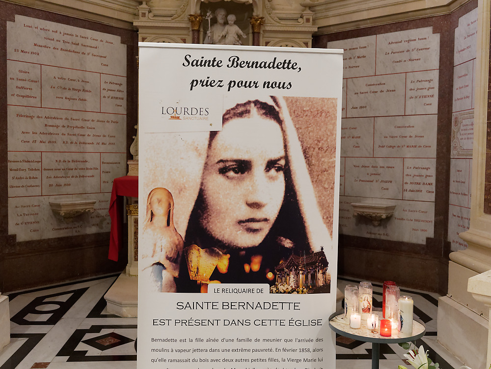 Poster announcing the presence of the relics of St. Bernadette of Lourdes