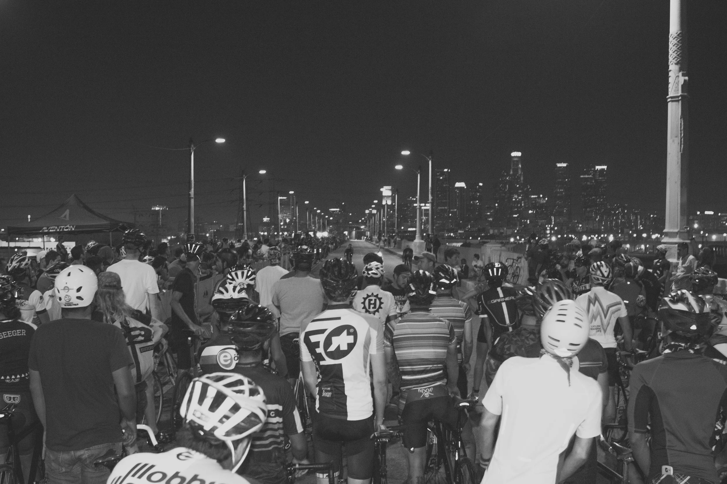 9. Riders wait for their start at the Wolfpack Hustle drag races on the 6th St bridge in Los Angeles.