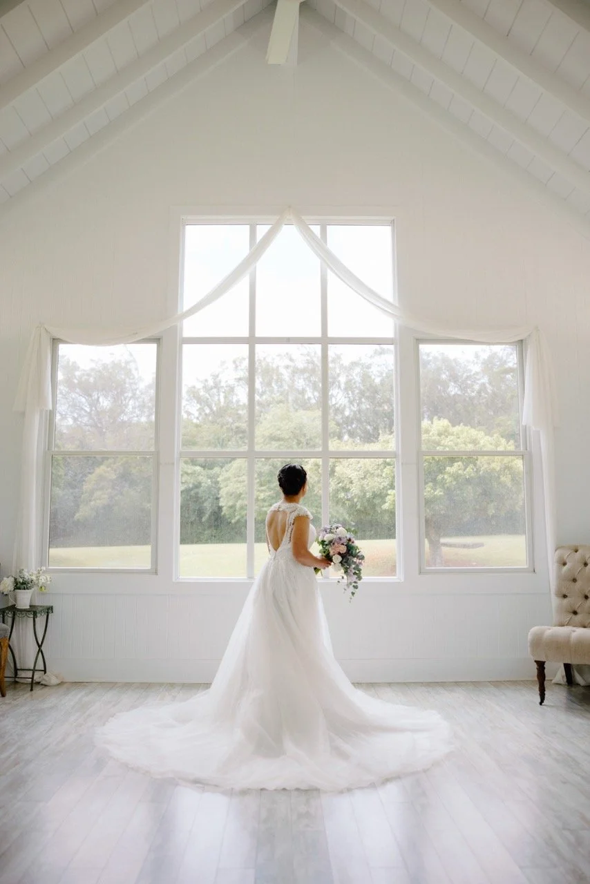 Bride getting ready in the courtyard chapel at Sunset Ranch Hawaii