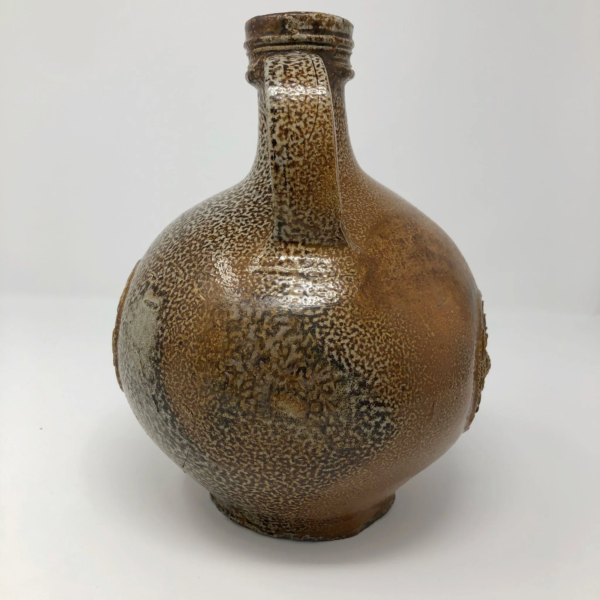 Jug with face handle view.JPG