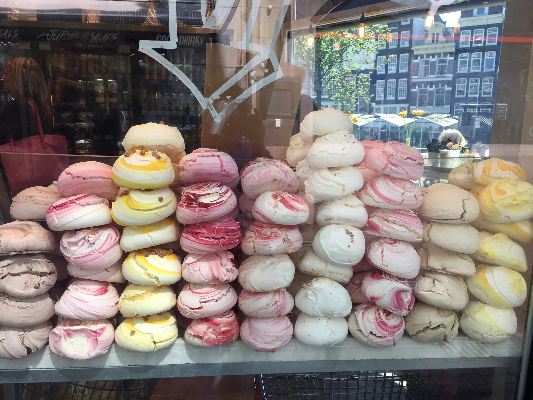Meringue! A sweet shop with big cookies made of meringue! Now, Dean's mom and daughter can both make a mean meringue, but this was not like that. Theirs is soft and fluffy, and usually found on top of a scrumptious piece of pie, but this was a hard meringue cookie. They had all sorts of flavors as the image shows. We got a lemon one, which we could only barely tell was lemon. But it was good, though very dusty as we crunched it away!