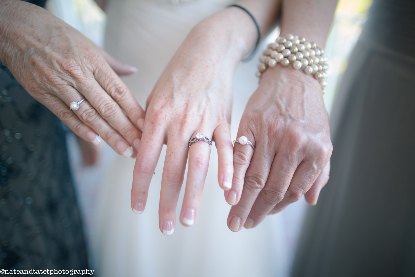 The Bride, Mother of the Bride and Mother of the Groom. The Mothers are both wearing the beautiful rings that the Bride had made for them as a special gift. 
