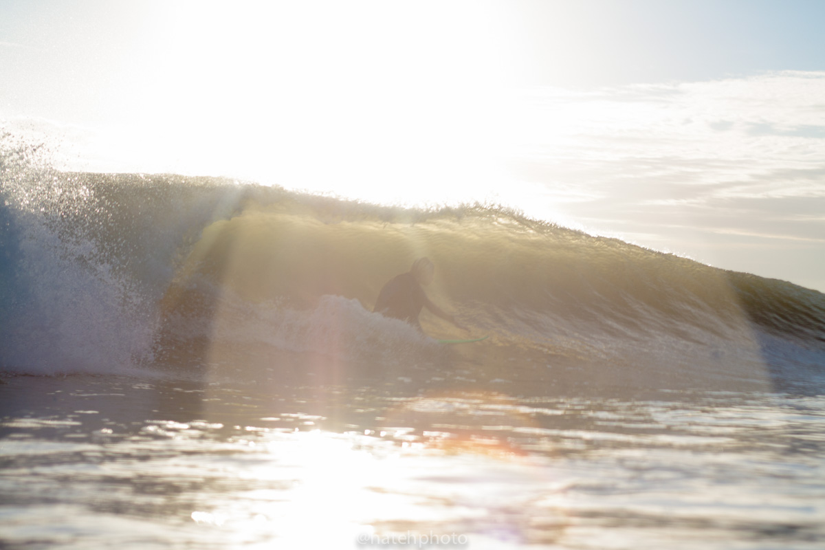 Tucking in for one of the better barrels of the day, this grom was all time stoked! He's probably still thinking about that one... 