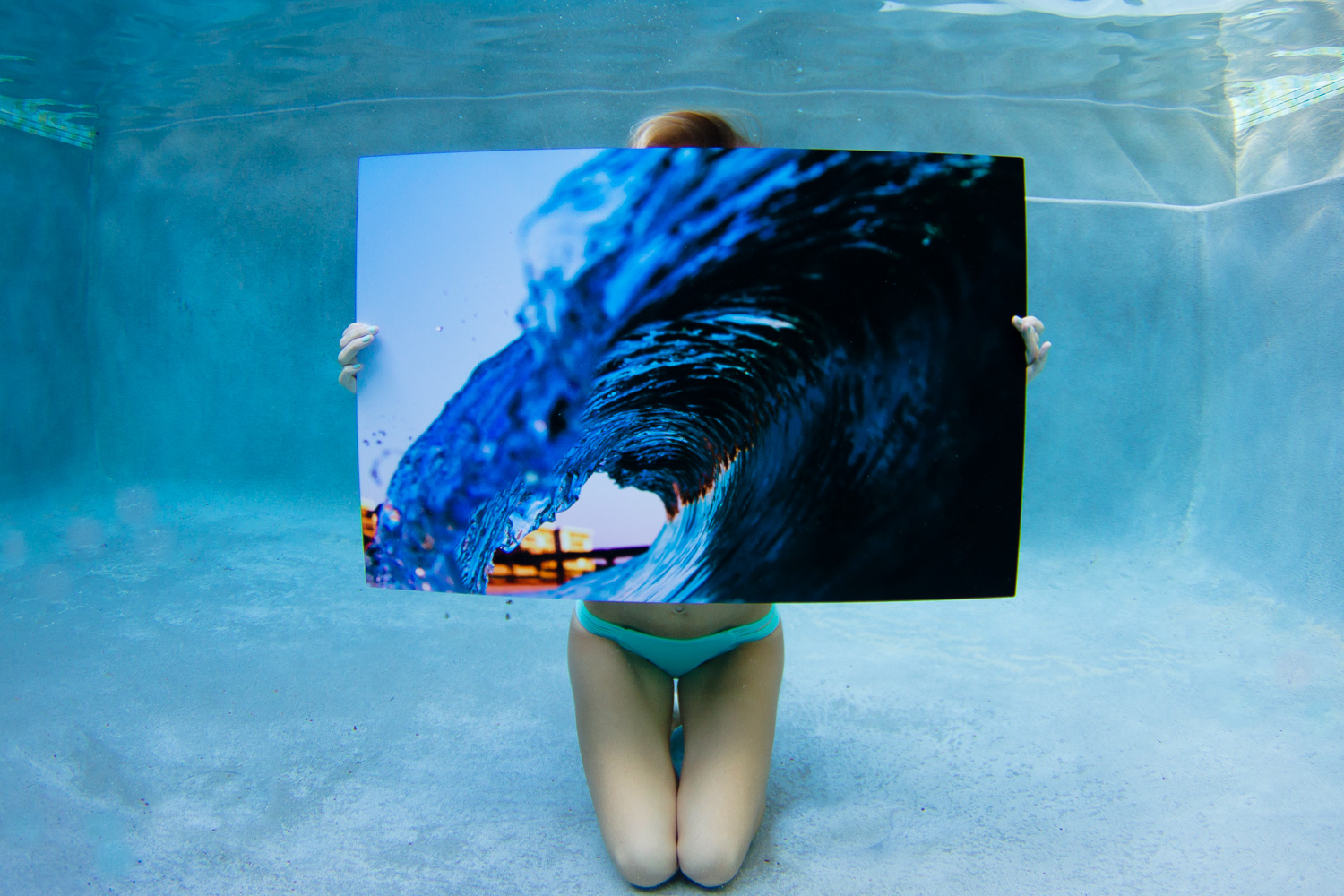 The finished print on Aluminum. I choose metal because of the color and the durability. As seen here this print is fully submerged underwater, and this print now hangs in La Tabla Cafe where no one would ever know its been in a pool. The sublimation process makes way more sense than laying ink on material. Its more vibrant, perfect smooth texture in the print as if it was real life, and very weather/scratch resistant. 